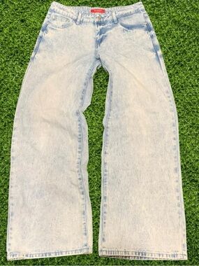 Guess Mila palazzo light-wash denim jeans featuring a wide-leg cut size 28x32